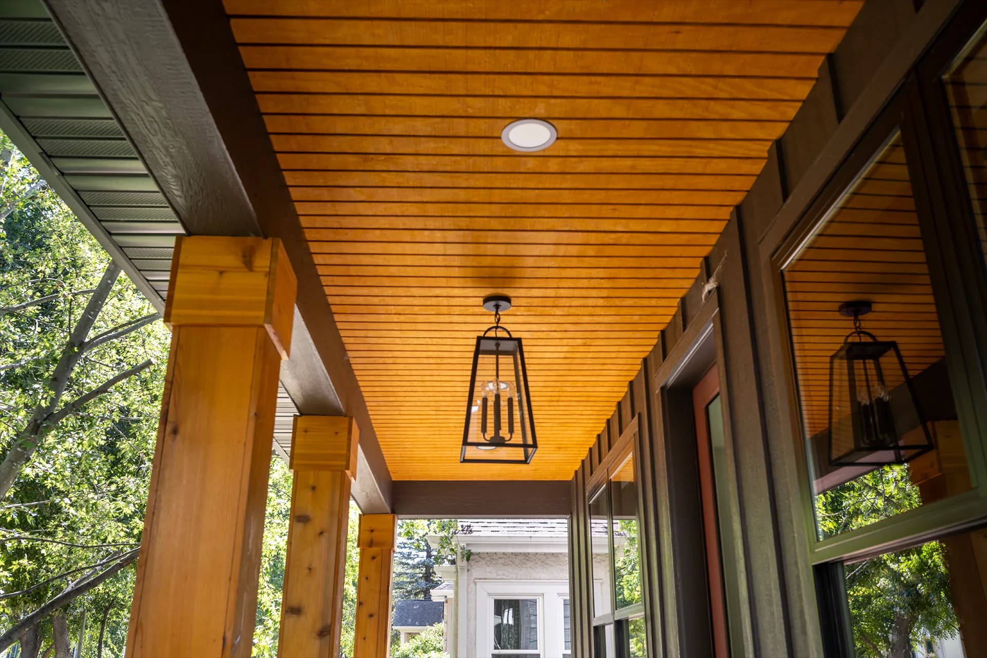 Porch exterior view of Chowen Ave S in Minneapolis, Minnesota, featuring LP SmartSide Lap Siding and LP SmartSide Vertical Panels.