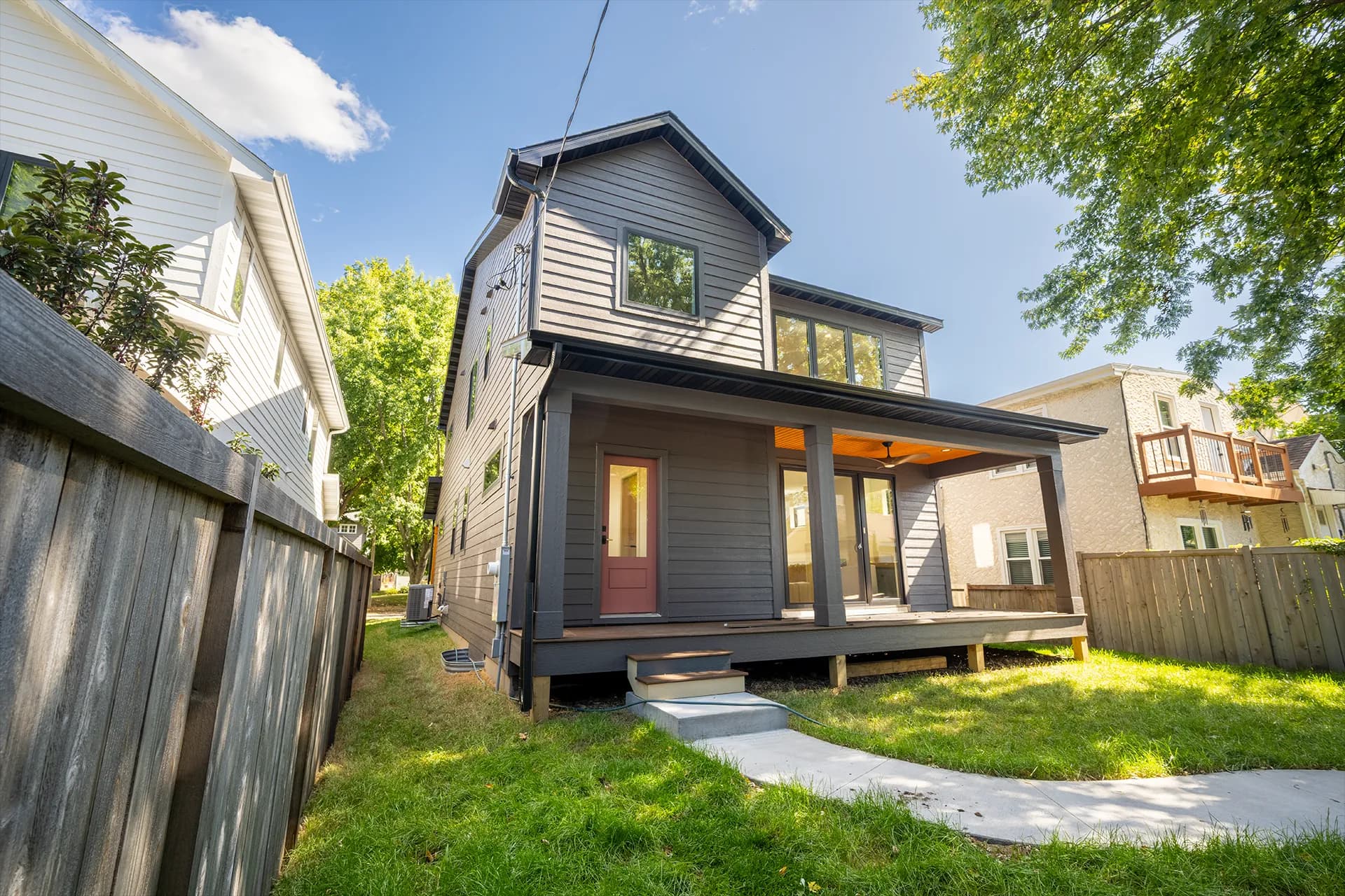Rear and side exterior view of Chowen Ave S in Minneapolis, Minnesota, featuring LP SmartSide Lap Siding and LP SmartSide Vertical Panels.