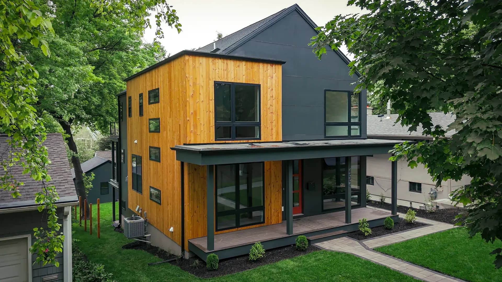 Additional exterior view of Washburn Ave S in Minneapolis, Minnesota, featuring Hardie Panels and Wood Accent Cladding.