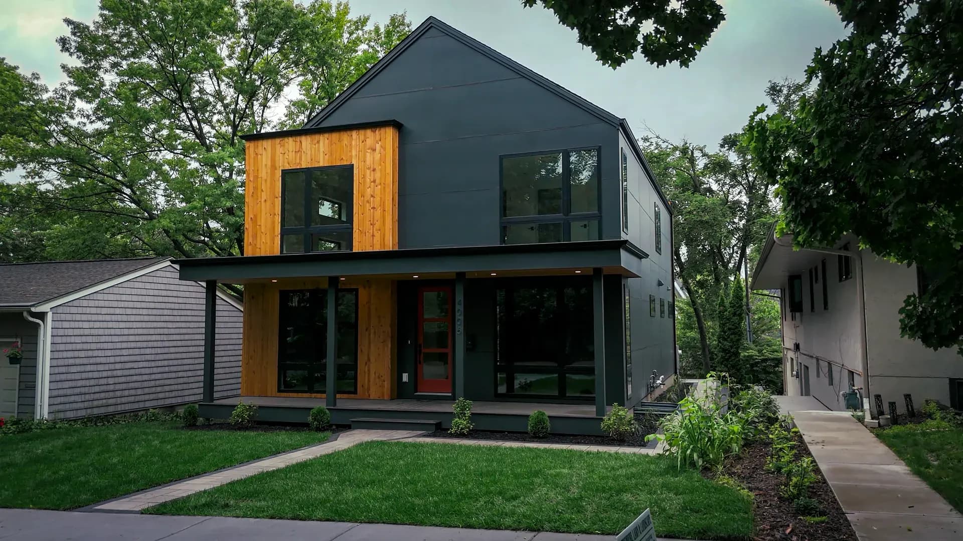 Additional exterior view of Washburn Ave S in Minneapolis, Minnesota, featuring Hardie Panels and Wood Accent Cladding.