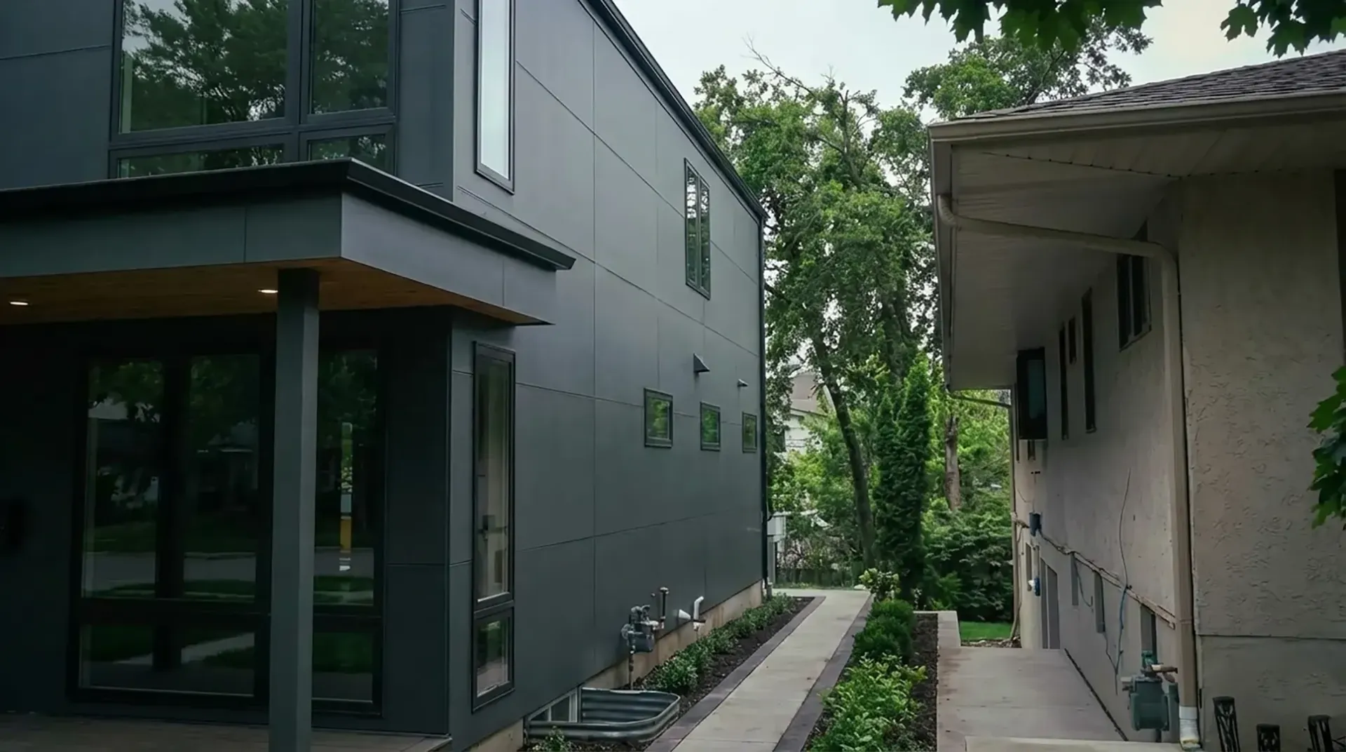 Additional exterior view of Washburn Ave S in Minneapolis, Minnesota, featuring Hardie Panels and Wood Accent Cladding.