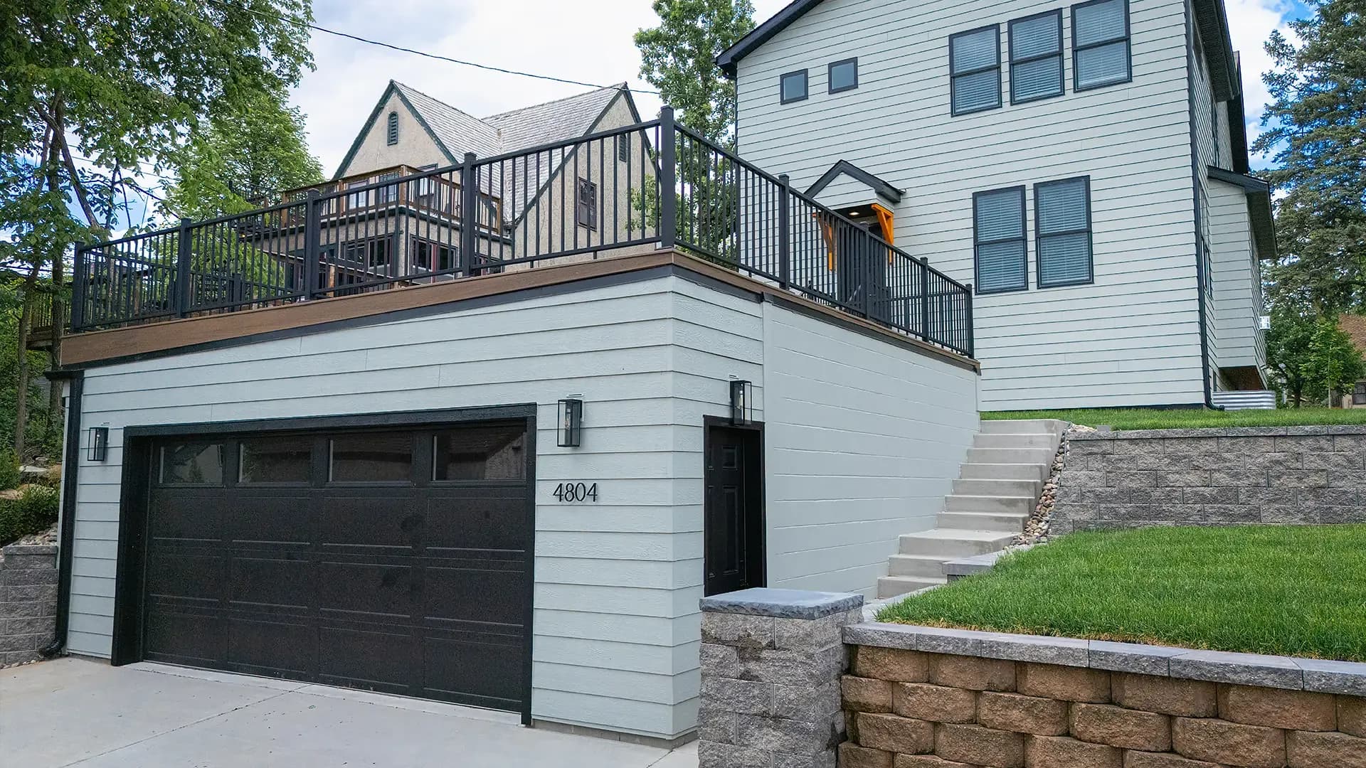 Engineered wood lap siding with contrasting trim