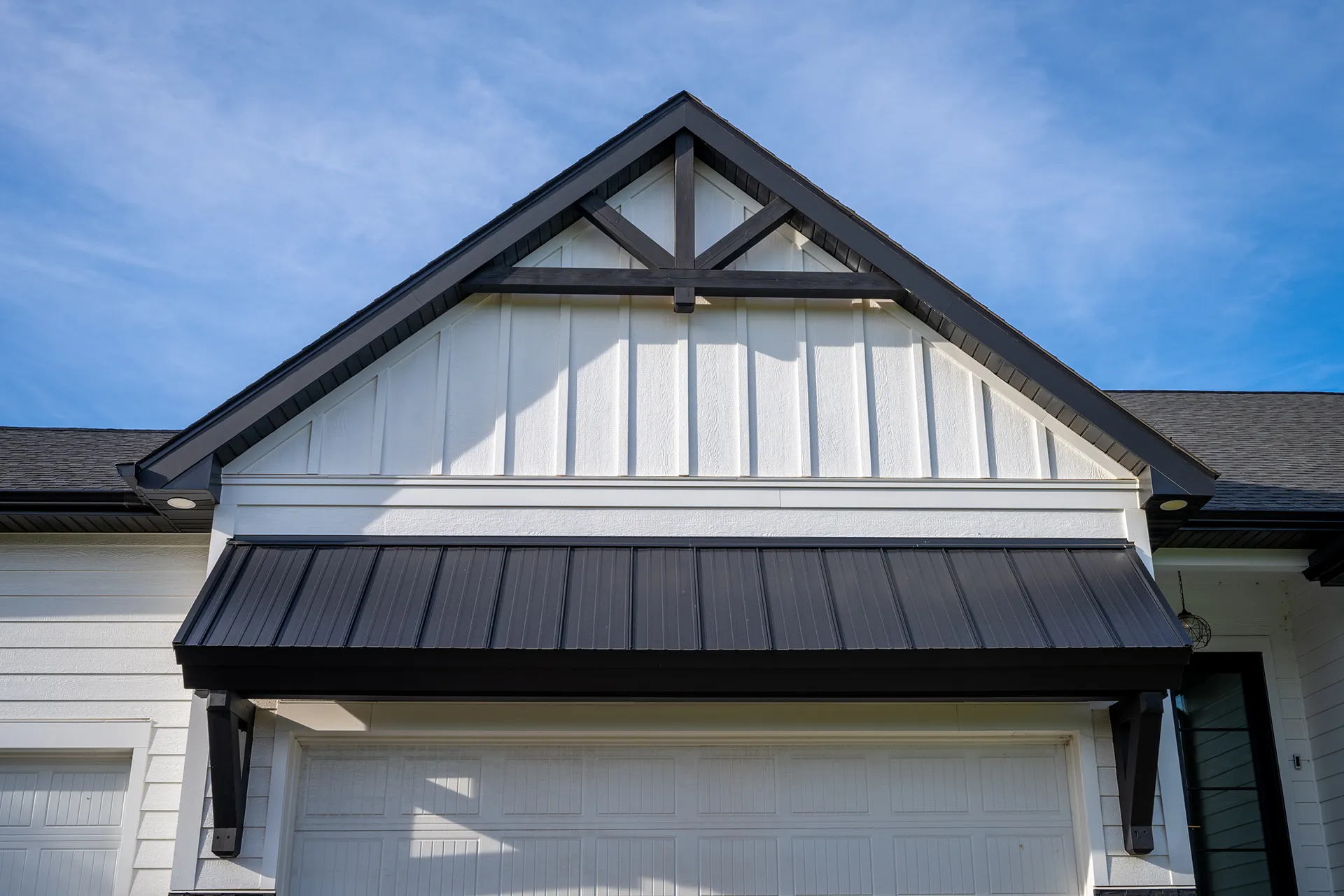 Gable detail of Otsego Construction in Otsego, Minnesota, featuring James Hardie Lap Siding and James Hardie Vertical Panels and Board-and-Batten.